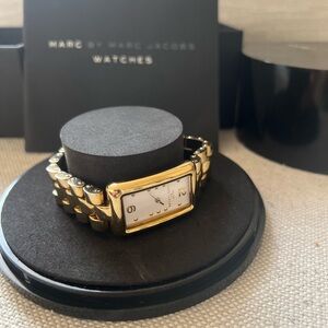 Gold Marc Jacob’s with rectangular face. All original pieces included